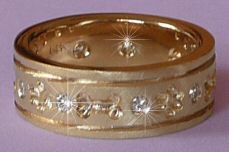 14K Gold Flat Band Ring with Carved Edging and Alternating Bones and Paws