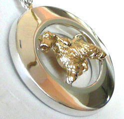 14K Gold or Sterling Silver Afghan Hound Trotting on Glossy Wide Oval with our Exclusive Enhancer Bail-Front Side View
