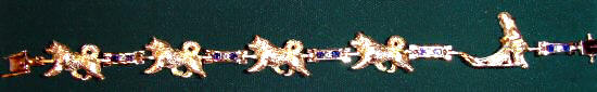 14K Gold Alaskan Malmute Bracelet with Diamond and Sapphire Links and Sled with Musher