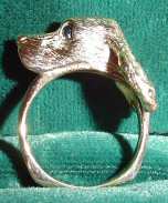 English Setter Ring with Sapphire Eye Sits Elegantly Atop the Finger