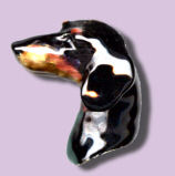 18K Gold and Enamel Smooth Black and Tan Dachshund Head with Ruby Bale