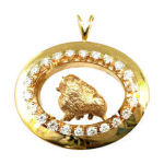 Our 14K Gold Pomeranian in Shadow Box enhanced with 1.2 carats of full cut diamonds,